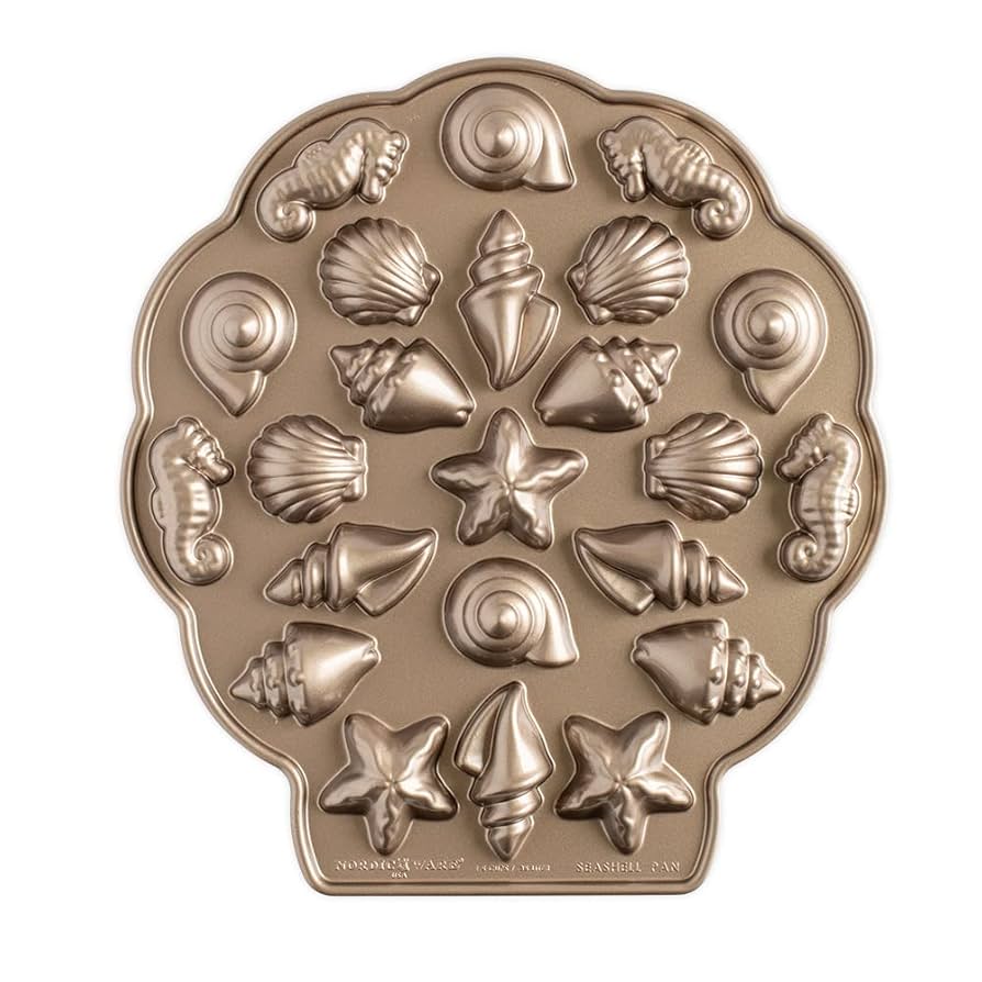 調理道具/製菓道具 Nordic Ware Sea Shell Teacakes Pan Amazon.com: Nordic Ware Seashell Bites Pan: Home & Kitchen